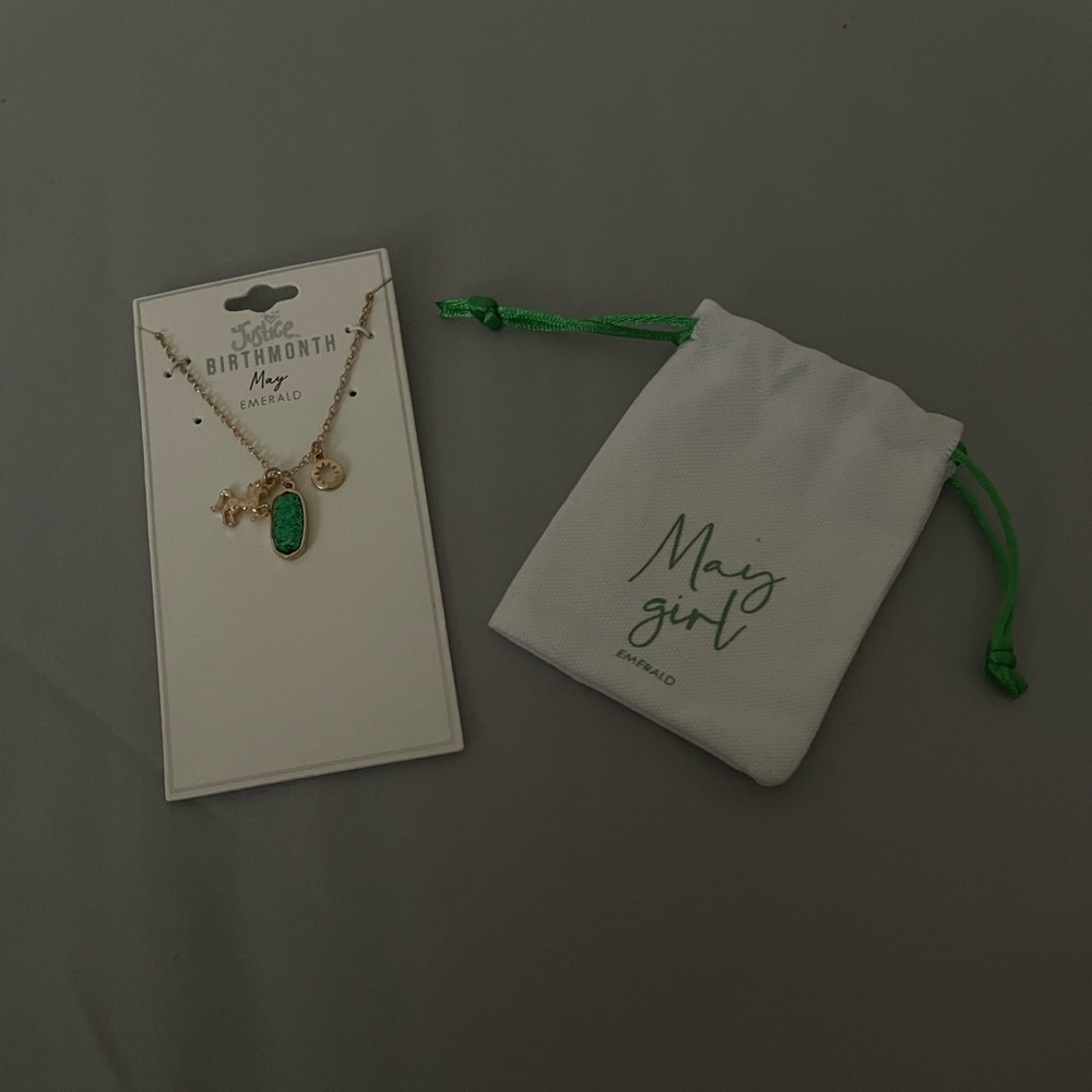 Justice MAY birth month color necklace. May girl with emerald green little bag.